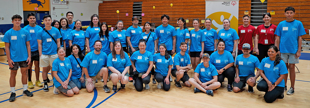 group photo of volunteers at a Special Olympics event