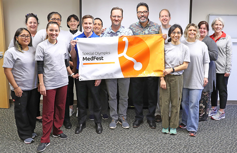 group photo of volunteers at a Special Olympics event