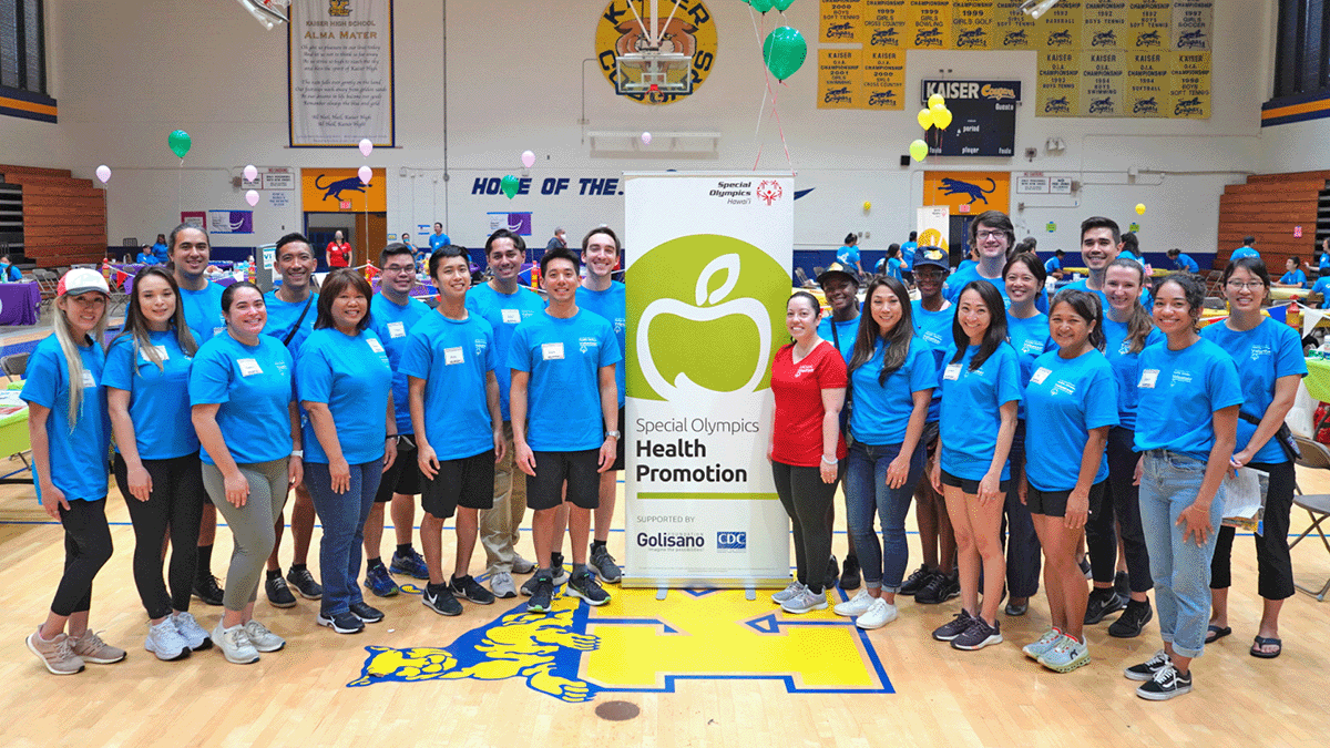 group photo of volunteers at a Special Olympics event